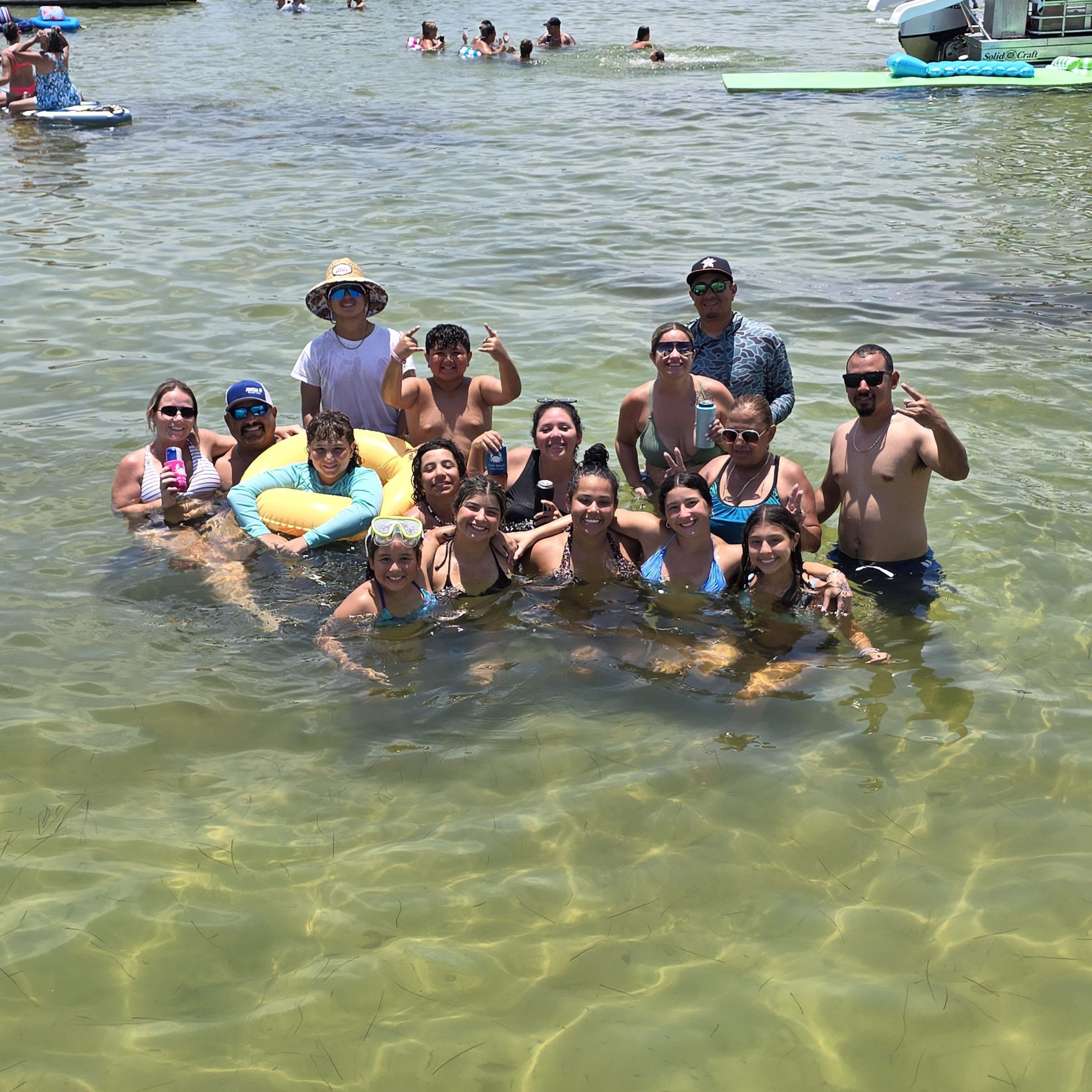 a group of people swimming in the water