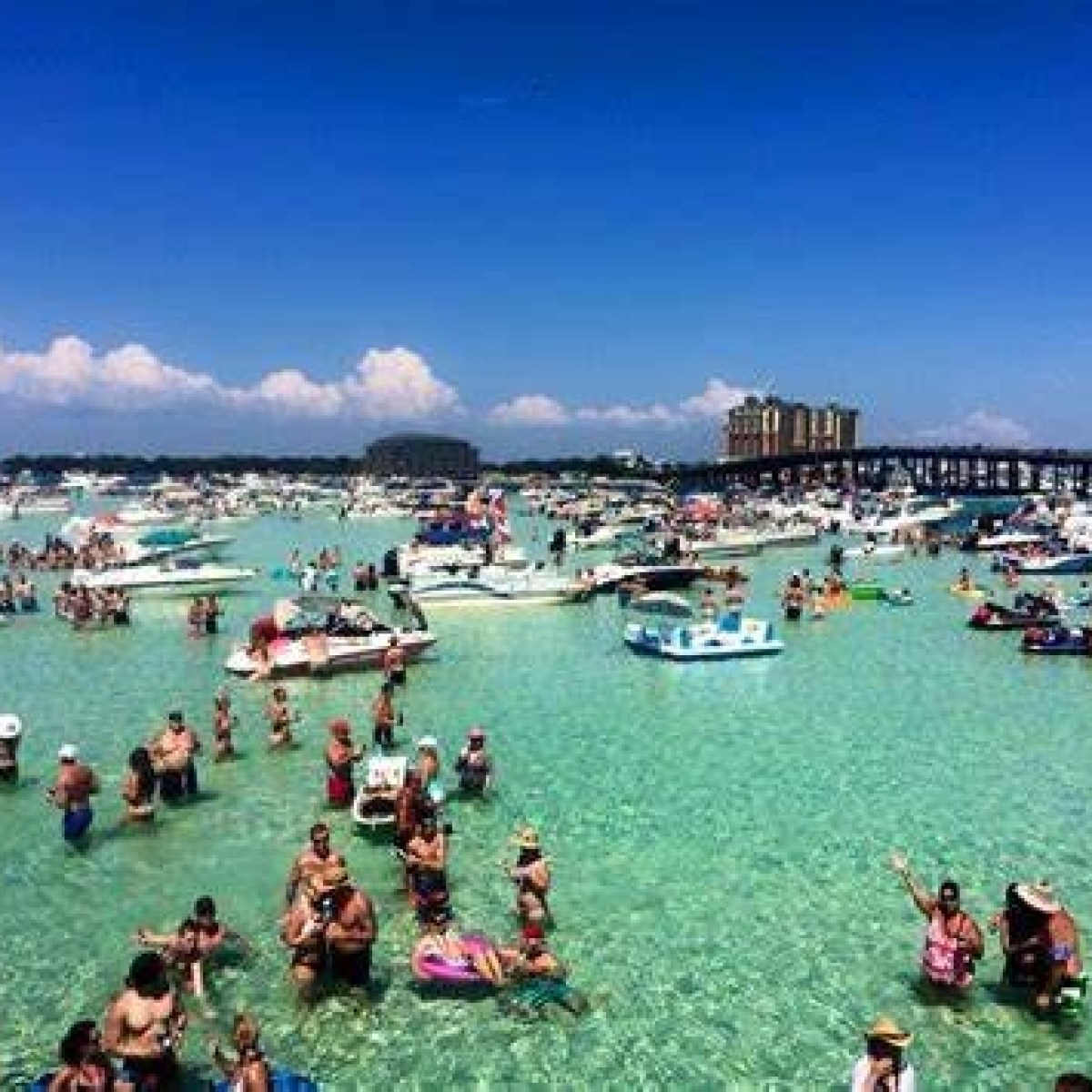 a group of people in a large body of water