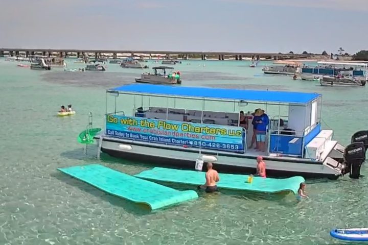 a group of people on a boat in the water