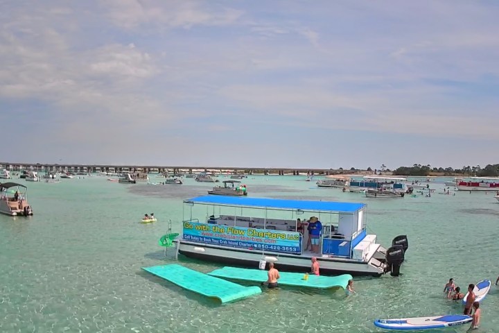a group of people on a boat in the water